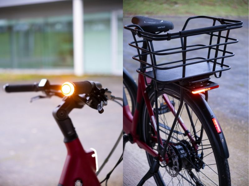 Les vélos Ellipse comprennent des clignotants intégrés au niveau du guidon et du porte-bagages.